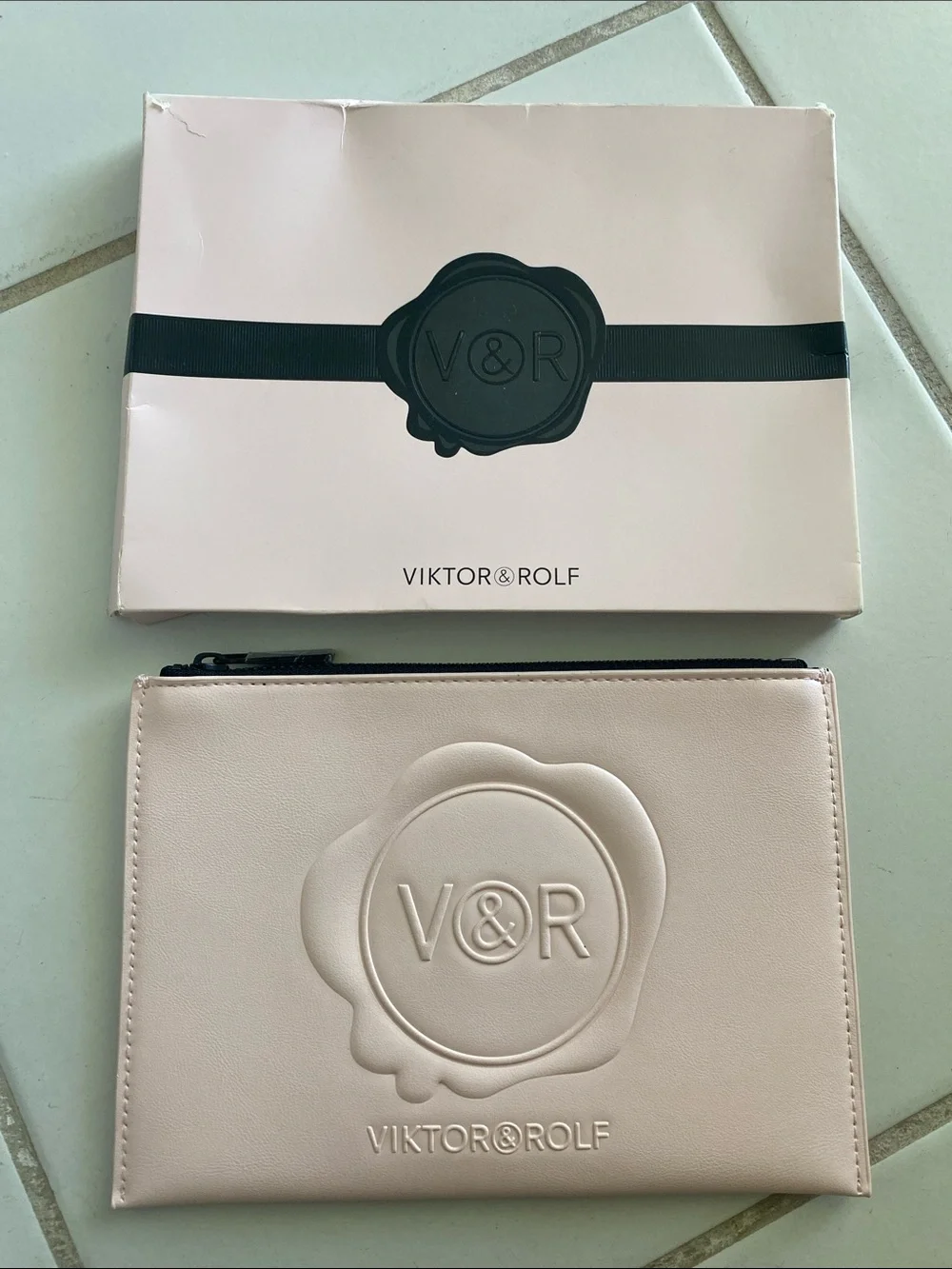 Viktor & Rolf Blush Pink Embossed V&R Zip Card Holder. Promotional item.